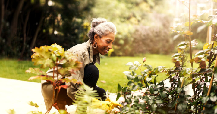 Woman smiling in her garden