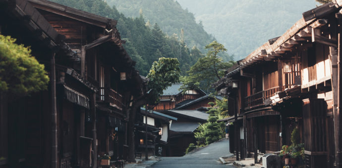 Japanese village with ryokan houses along the Nakasendo Trail.