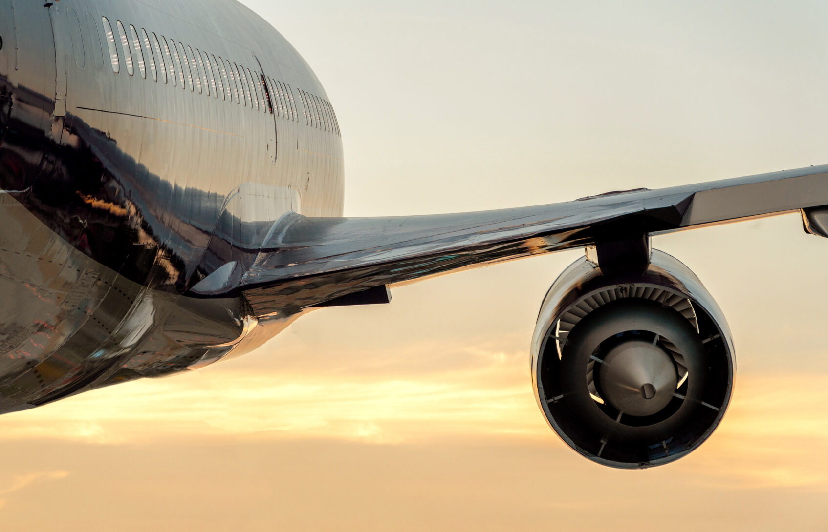 One of the engines on a large airplane, hanging down from the wing.”