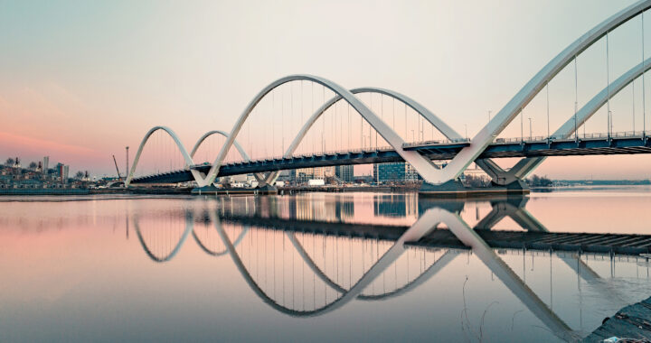 A curvy bridge spanning a body of water