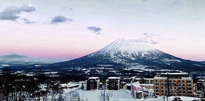 Mount Yotei at dusk with the town of Hirafu in the foreground.