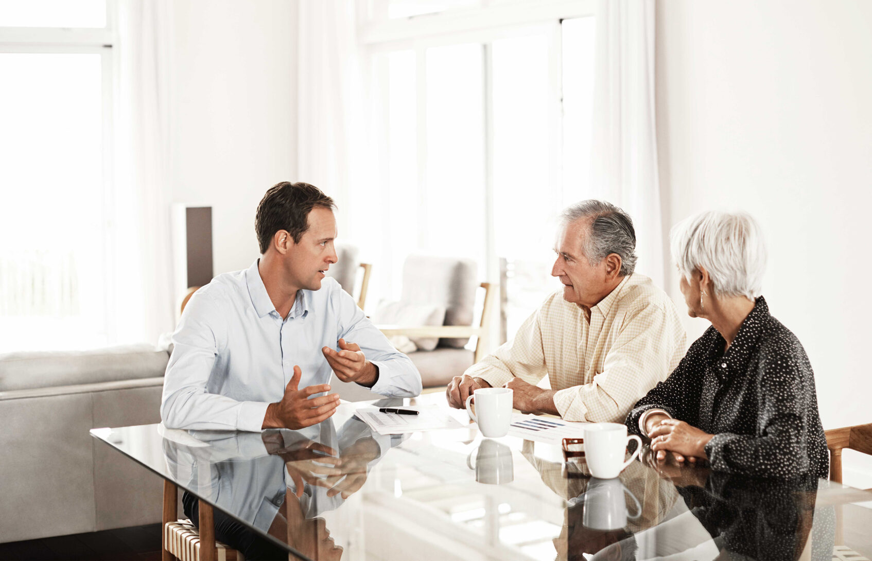 Financial advisor meeting with a senior couple.